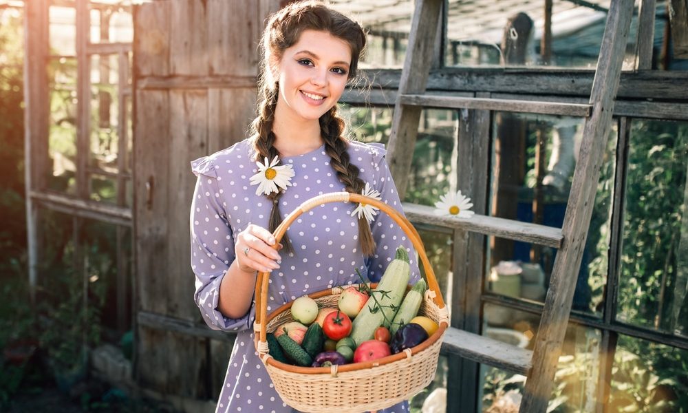 Girl in Garden with Harvest Basket